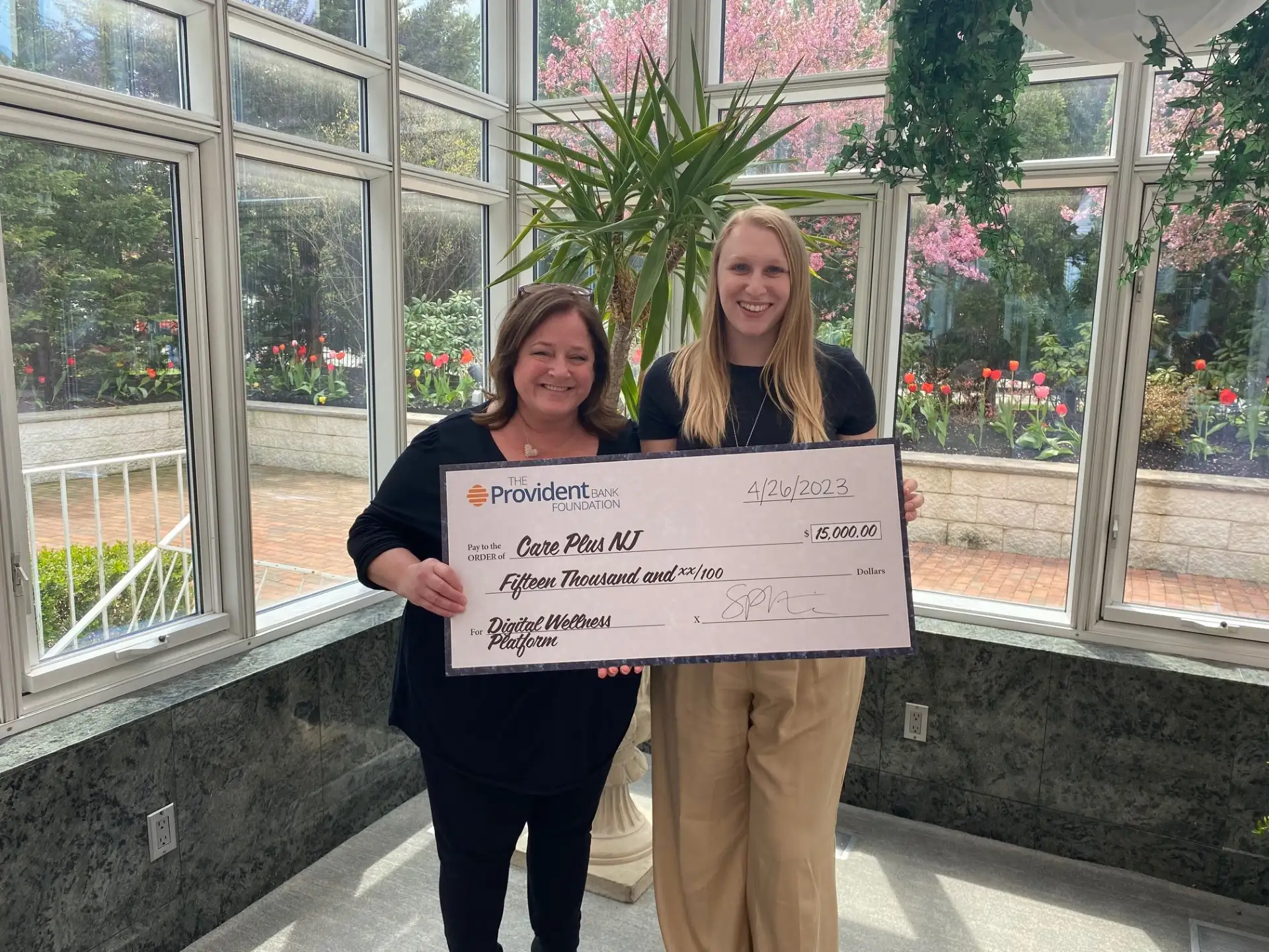 Receiving Provident Bank Foundation Grant Check for Digital Well-Being App at Care Plus NJ | Care Plus NJ